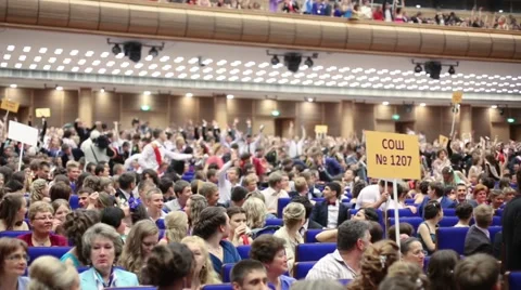 Graduates are doing wave on hall and upper circle Stock Footage 47794729