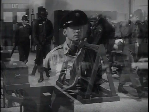 Graduates of basic military training march in formation in the 1950s. Video stock 75275110