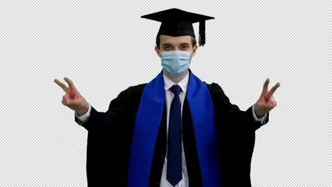 Graduating student in protective mask doing hand gesture with v sign, alpha in Video stock 137157384