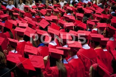 Graduation Cap and Gowns Stock Photos