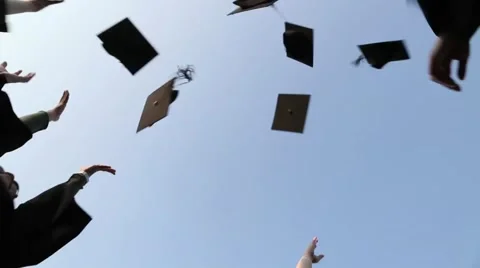 Graduation caps are tossed into the air by a happy asian girls group friends-Dan Stock Footage