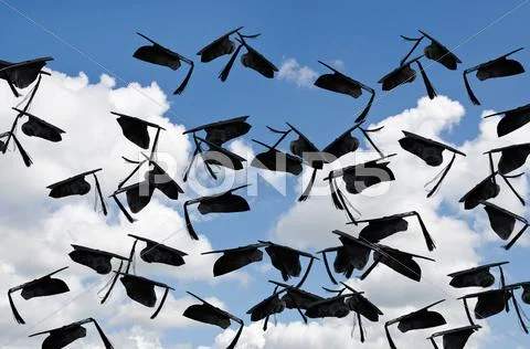 Graduation caps in sky Stock Photos