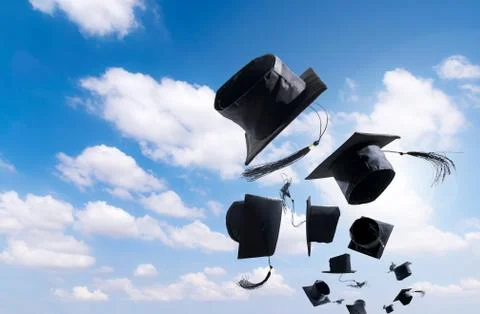 Graduation Ceremony, Graduation Caps, hat Thrown in the Air with bluesky abstrac Stock Photos
