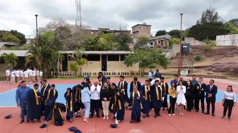 Graduation Ceremony with Students Throwing Caps in Tegucigalpa, Honduras Stockbeeldmateriaal 303509873