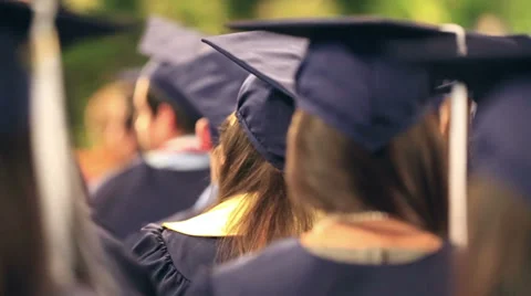 Graduation class students in auditorium, cap and gown Stock-Footage 37741887