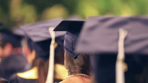 Graduation class students in auditorium, cap and gown Stock-Footage 37741916