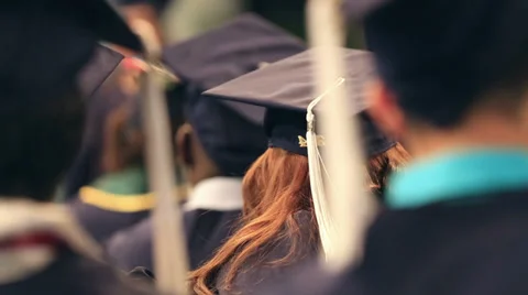 Graduation class students in auditorium, cap and gown Stock-Footage 37741953