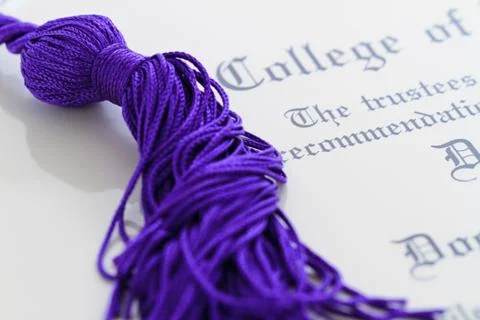 Graduation document and tassle Stock Photos