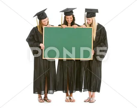 Graduation: group of girl graduates hold blank chalkboard Stock Photos