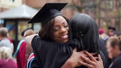 Graduation Success, Happy Black College Graduate Female Hugged By Proud Mother Stock Footage
