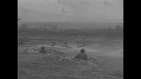 GRAFENWOHR, GERMANY - 1949: Muzzle over village - A muzzle looms over a foxhole 스톡 동영상 344005918
