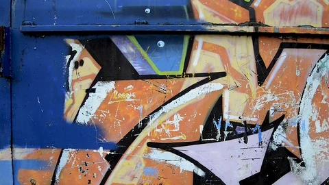 Graffiti on an abandoned rusty train car Видео 129756413