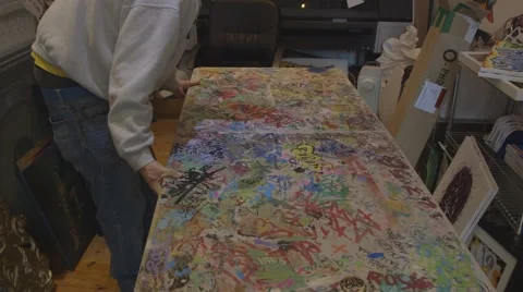 Graffiti Artist Sets up Table Stock Footage 59421750