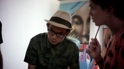 Graffiti artists discussing at studio. Stock Footage 63428372