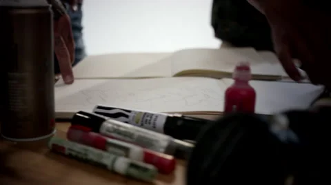 Graffiti artists planning at studio. Stock Footage 63428204