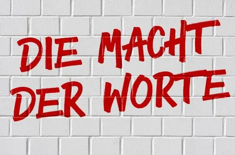 Graffiti auf einer Backsteinmauer - Die Macht der Worte auf Deutsch Graffi... 写真素材