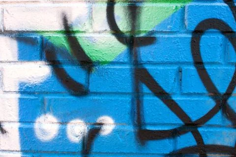 Graffiti on brick wall Stock Photos