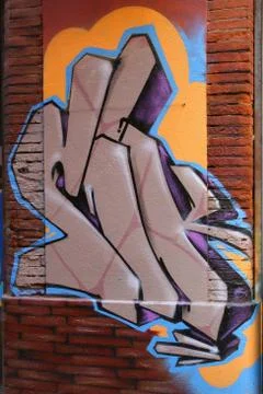 Graffiti on a brick wall Stock Photos