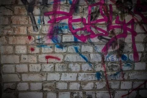 Graffiti on a brick wall Stock Photos