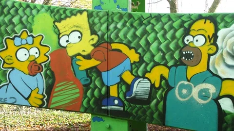 Graffiti on bridge with the Simpsons on ... | Stock Video | Pond5