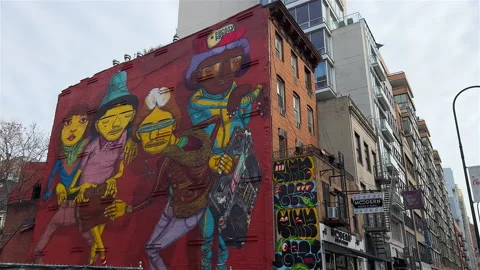 Graffiti character Artwork on side of building, New York City - 4K Prores 422 Stock Footage 231946873