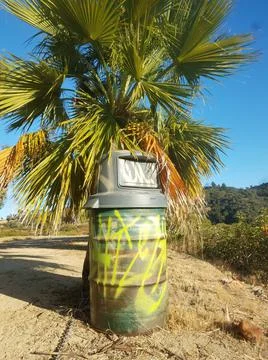 Graffiti Covered Garbage Can in Griffith Parks Stock Photos
