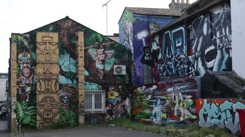 Graffiti-covered yard Stock Footage 65163517