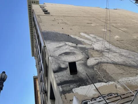 Graffiti face on building Stock Photos