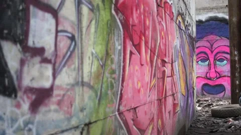 Graffiti Face On A Derelict Wall Stock Footage 130898407