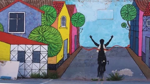Graffiti man on bicycle Video stock 77321593