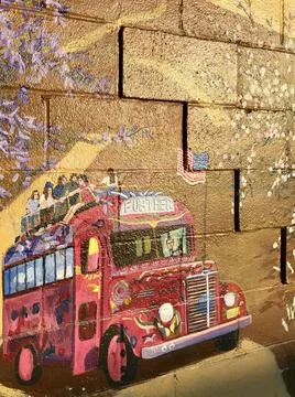 Graffiti of the old bus on the brick wall Stock Photos