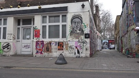 Graffiti on old pub brick lane Stock Footage 73638560