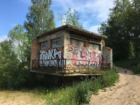 Graffiti on old technical building in a small town Stock Photos