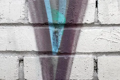 Graffiti painted on a brick wall texture. Stock Photos