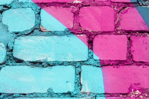 Graffiti painted on a brick wall texture. Stock Photos