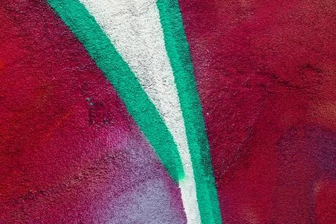 Graffiti painted on a concrete wall texture. Stock Photos