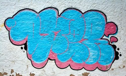Graffiti painted on public wall Stock Photos