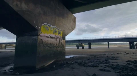 Graffiti on pillar below a bridge Stock Footage 66777758