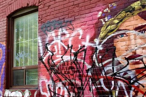 Graffiti on Red Brick Foto stock