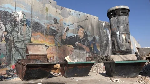 Graffiti of resistance painted on separation wall in Bethlehem, West Bank Stock-Footage 85861654