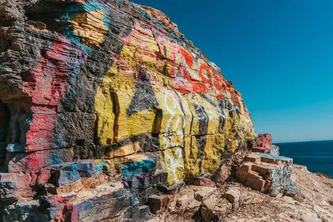 A graffiti on the rock at Sunken City Stock Photos