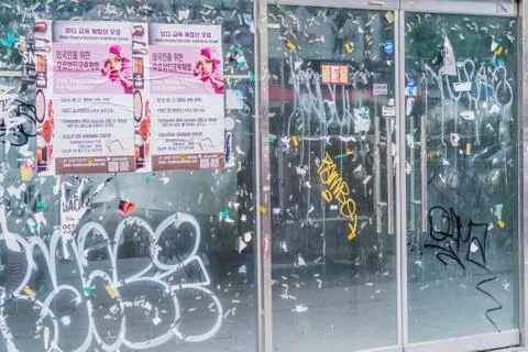 Graffiti scribbled across store windows 写真素材