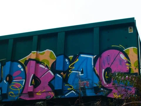 Graffiti on side of railway cargo container Stock Photos