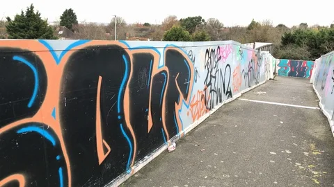 Graffiti on the sides of the overpass Stock Footage 121036551