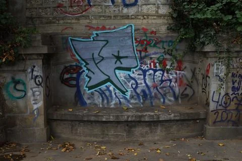 Graffiti on a stone wall Stock Photos