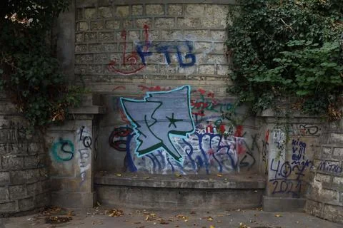 Graffiti on a stone wall Stock Photos