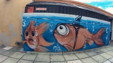 Graffiti Street Art. Colorful Fish On Alleyway Wall.Urban Outdoors Youth Culture Stock Footage