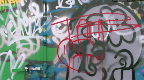 Graffiti structure over to reveal many graffiti walls, WS, handheld Stock Footage 53347666