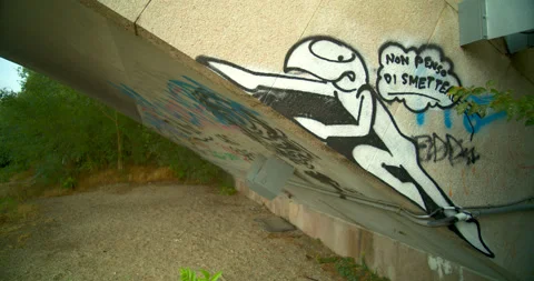 Graffiti Tags on Concrete Wall of Small Italian Bridge Vie for Space DCI 4K Stock Footage 202291744