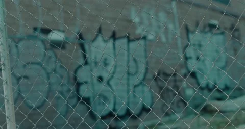 Graffiti Through Gate Stock Footage 193675846